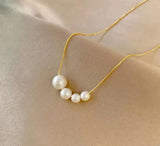 Gold freshwater pearl necklace